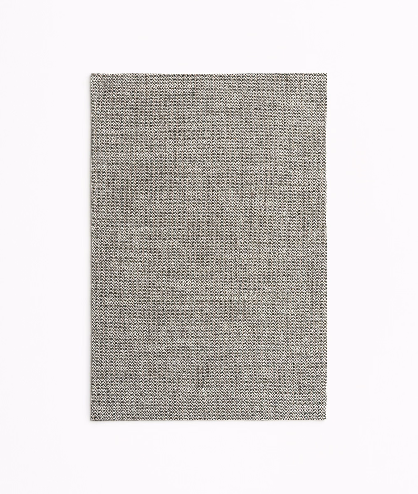 Warm stone-grey Chambray Roccia with a tiny salt-and-pepper checked weave