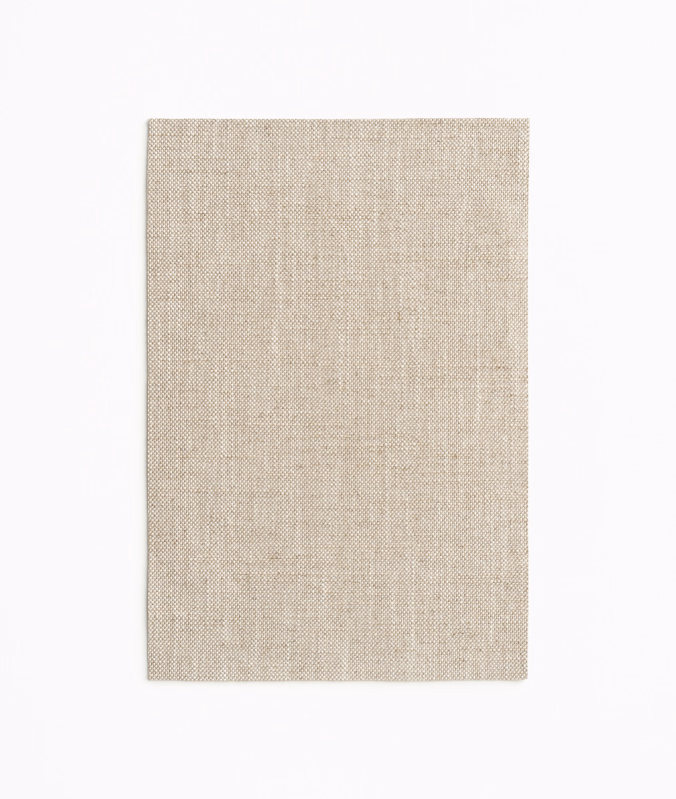 Soft greige-beige curtain fabric with a fine irregular woven texture