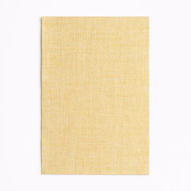 Pale straw-yellow woven swatch with a fine crosshatch texture