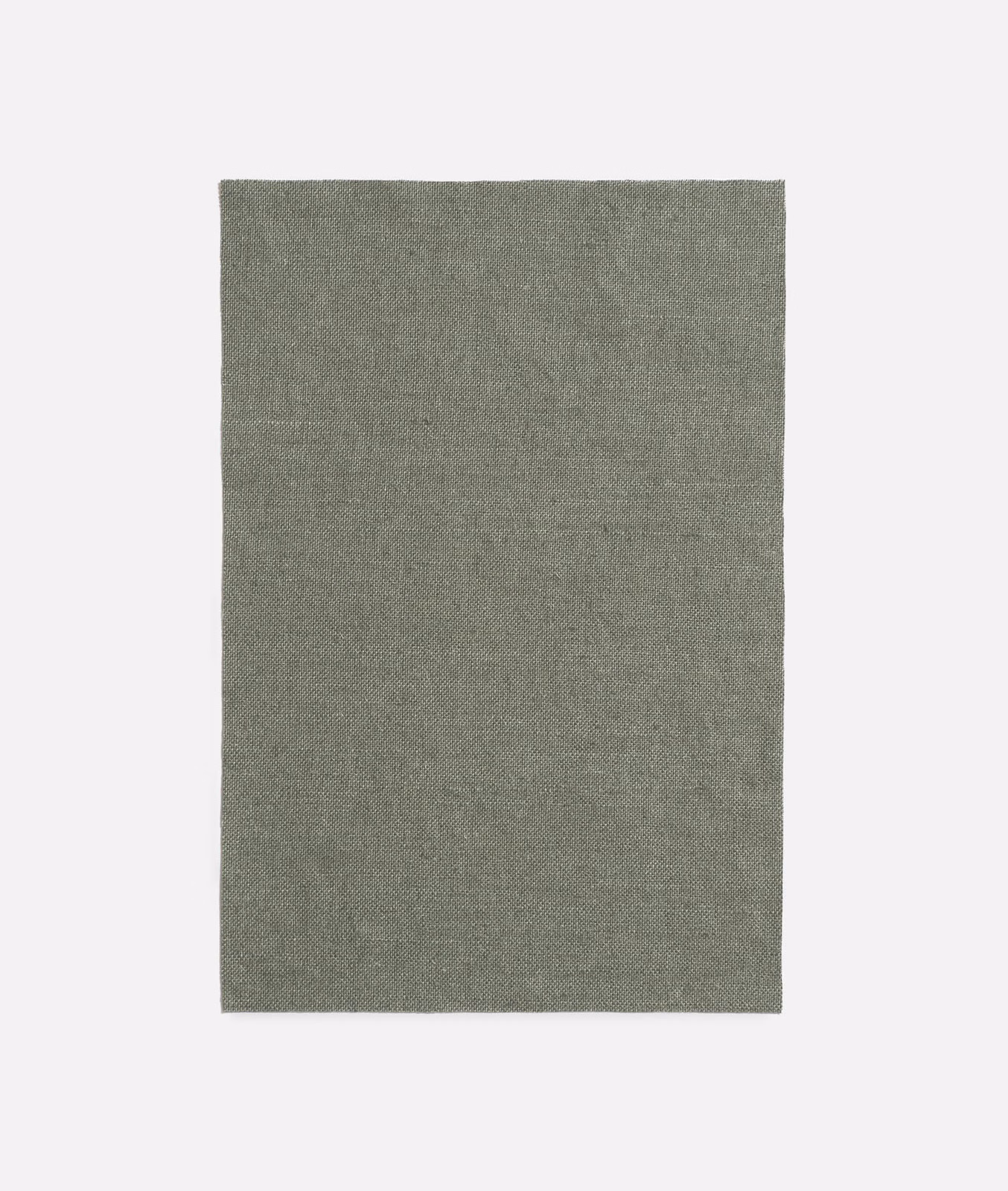 Muted agave grey-green curtain fabric with a fine, softly textured plain weave