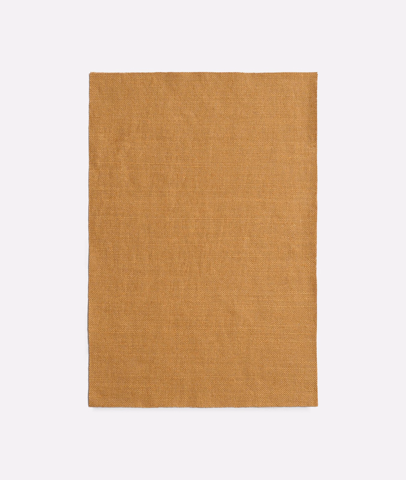 Warm amber-brown woven swatch with a fine, softly irregular surface