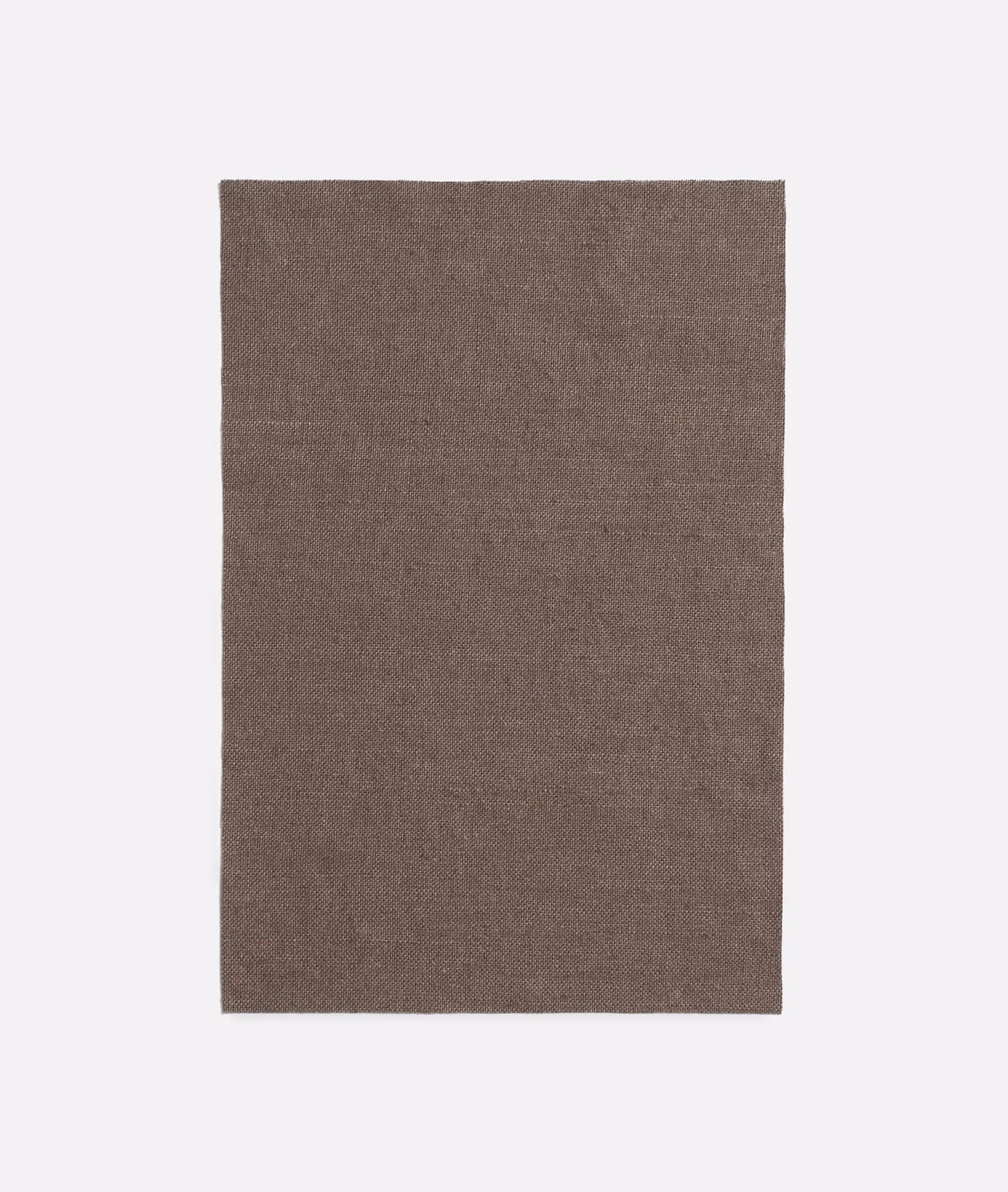 Muted cocoa-taupe plain weave with a softly mottled, fine texture