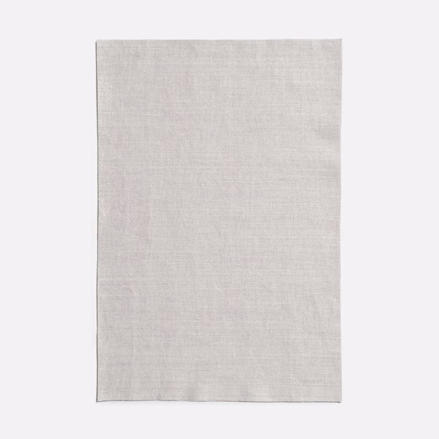 Pale ice-grey woven fabric swatch with a fine, softly irregular texture