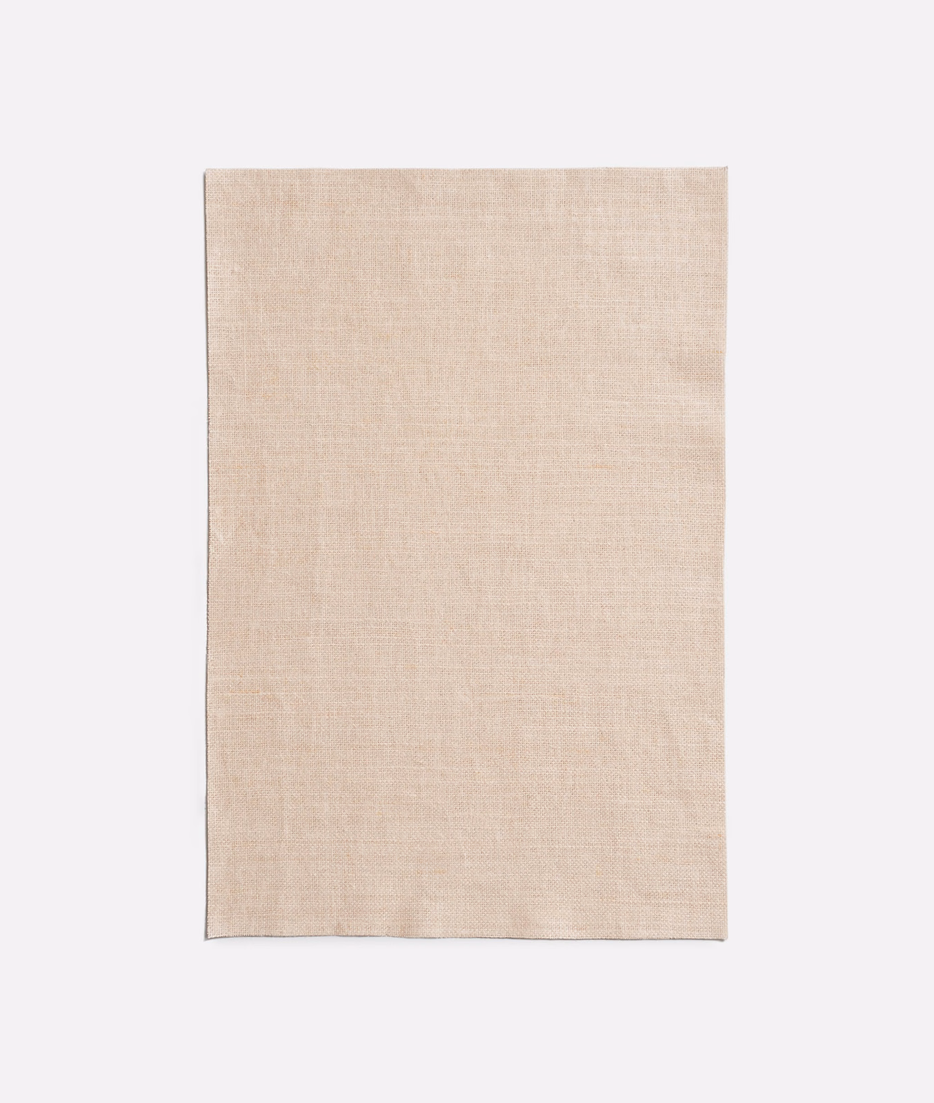 Warm pale mastice beige curtain fabric with a fine subtly textured weave