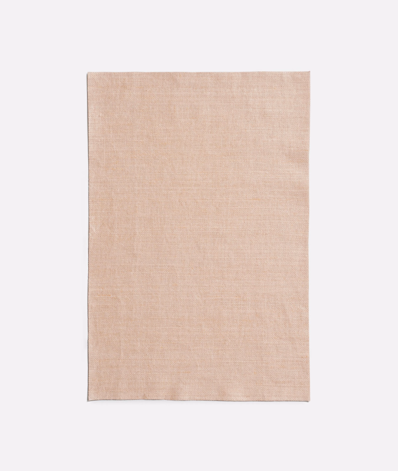 Pale blush-pink Dedar fabric swatch with fine texture and subtle tonal floral patterning
