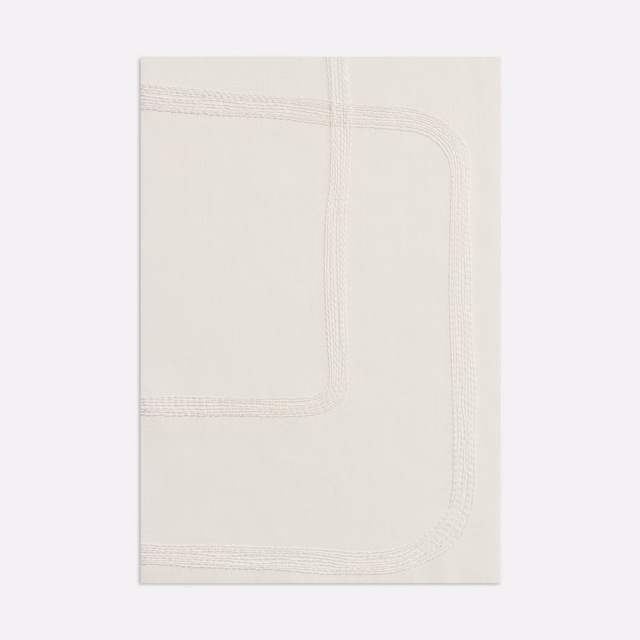 Warm ivory curtain fabric with tonal rounded rectangular line motif and subtle woven sheen