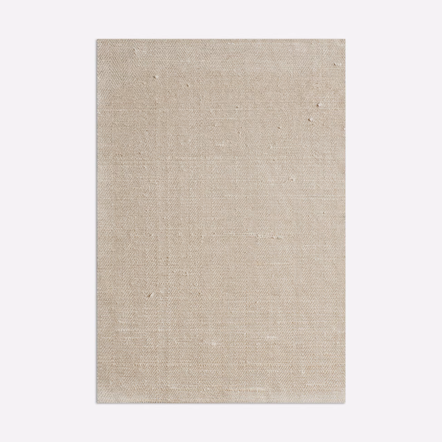 Pale alabaster beige fabric swatch with a fine, subtly slubbed woven texture