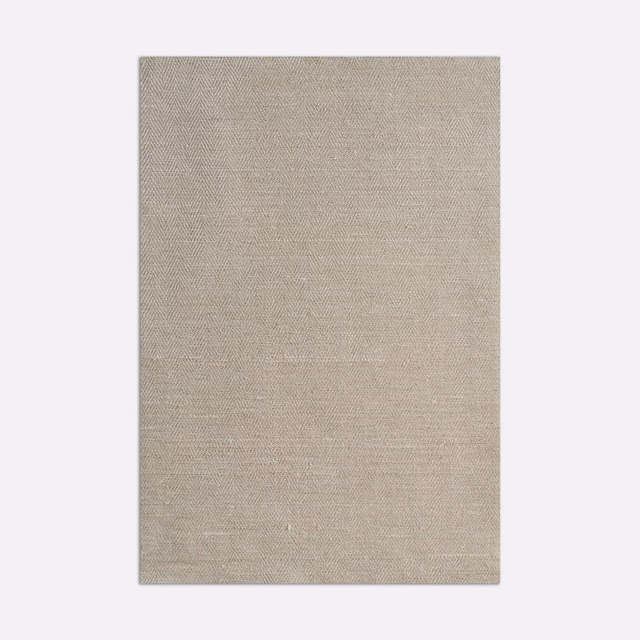 Warm greige taupe fabric with a fine, softly irregular woven surface