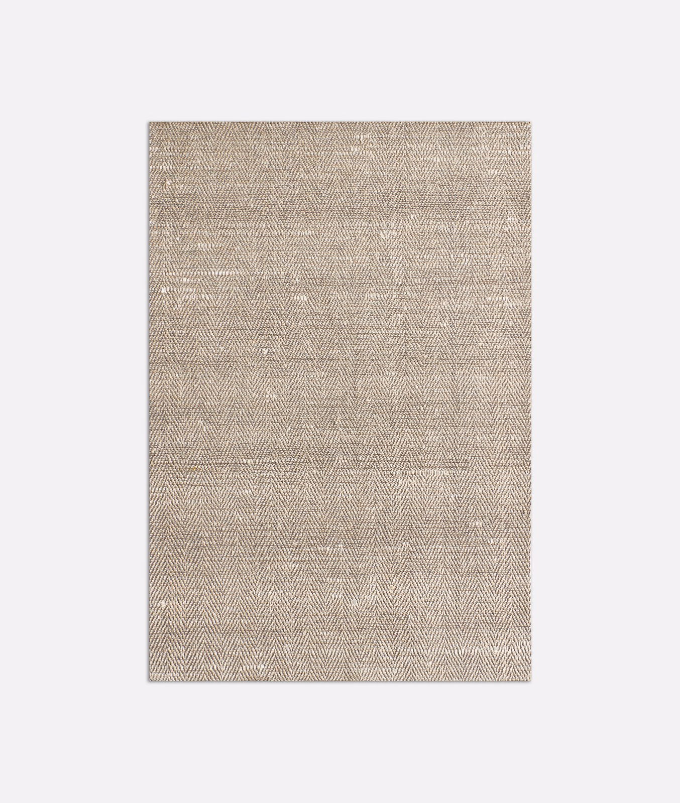 Warm sandstone beige curtain fabric with fine, directional herringbone weave