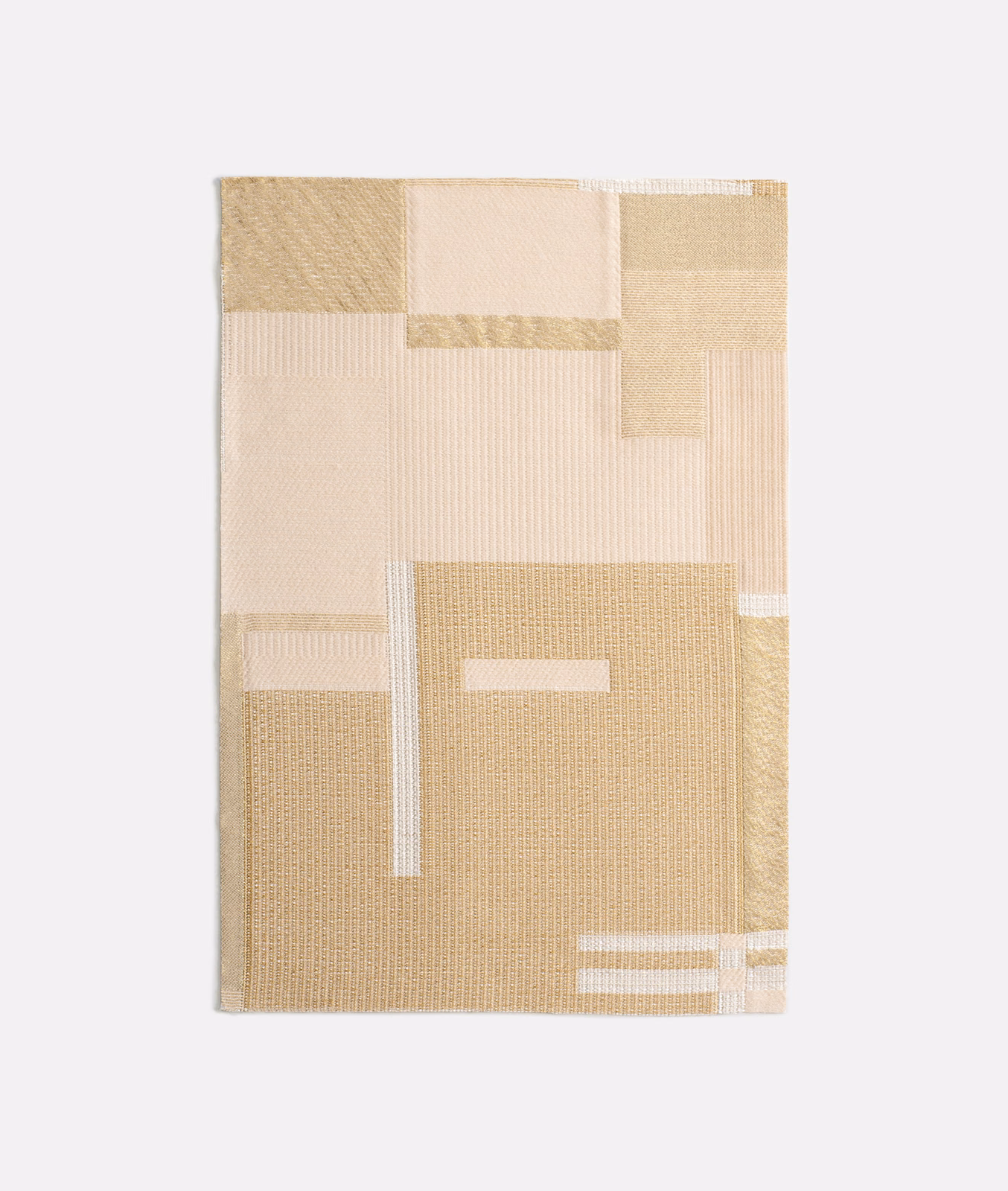 Warm ivory and sand geometric woven blocks with soft golden highlights