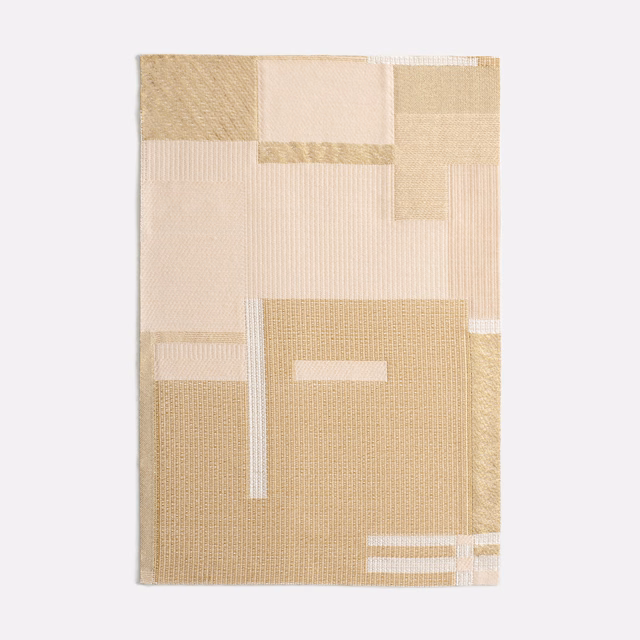 Warm ivory and sand geometric woven blocks with soft golden highlights