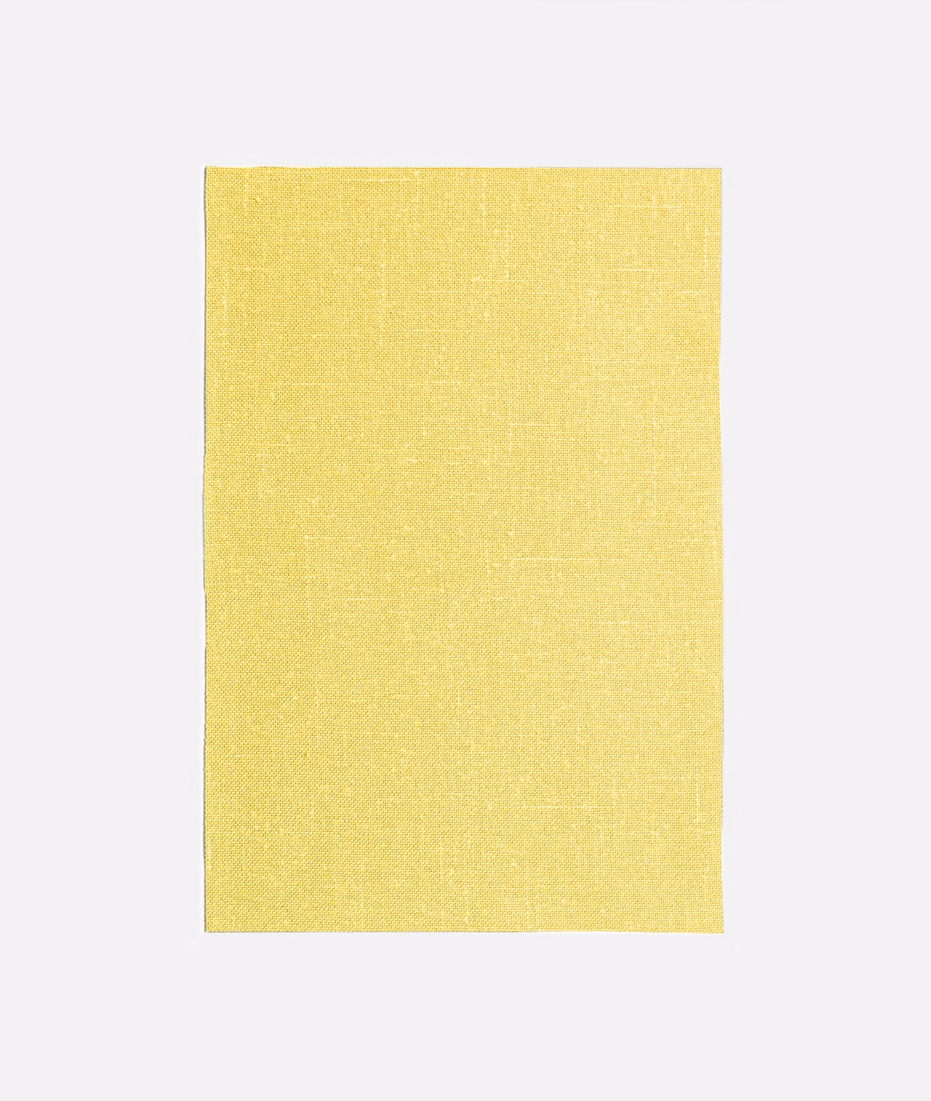 Pale canary yellow curtain fabric with a fine, subtly crosshatched woven surface