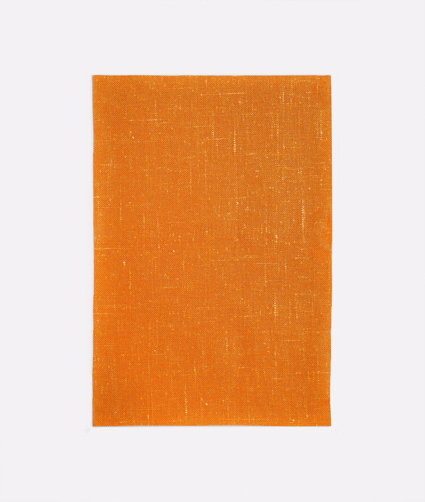 Warm tangerine-orange woven swatch with fine vertical slubs and golden flecks