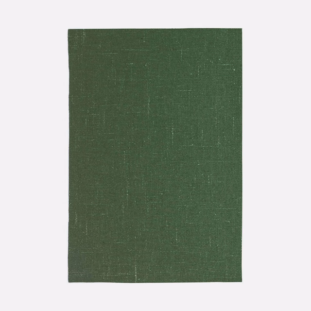 Deep malachite-green woven curtain swatch with fine vertical texture and subtle flecking