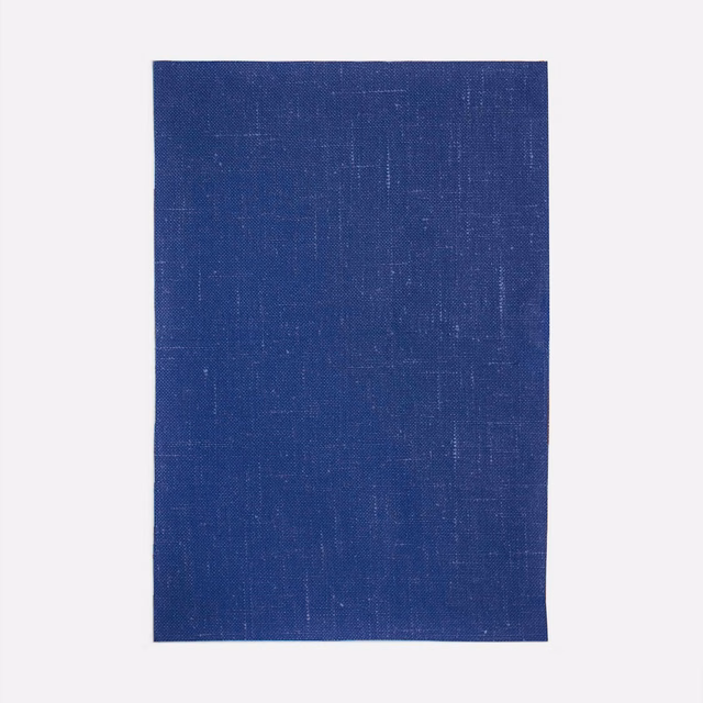 Deep marine blue curtain fabric with fine vertical irregularities and a softly grained weave