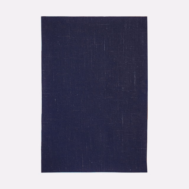 Deep ink-navy woven swatch with subtle crosshatch texture and faint vertical thread variation