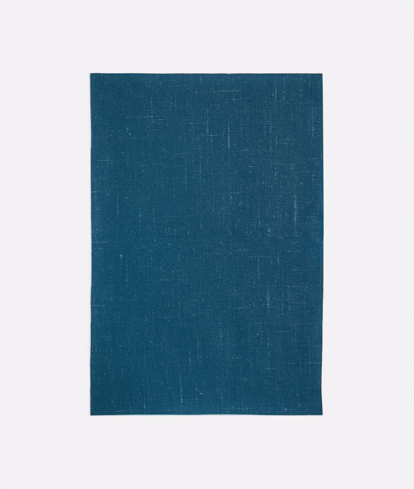 Deep blue-teal curtain fabric with a fine, subtly crosshatched woven surface