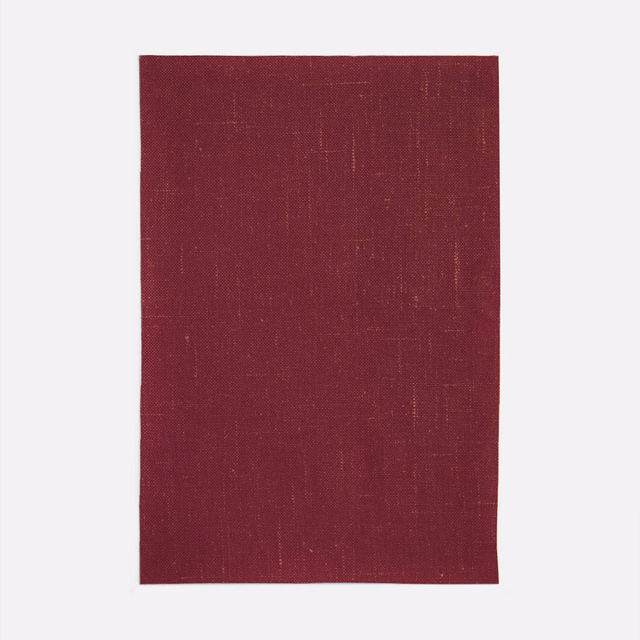 Deep plum-burgundy woven swatch with fine vertical striation and subtle crosshatch texture