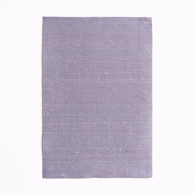 Dusty lilac-purple woven curtain fabric with fine horizontal slubs and subtle tonal texture
