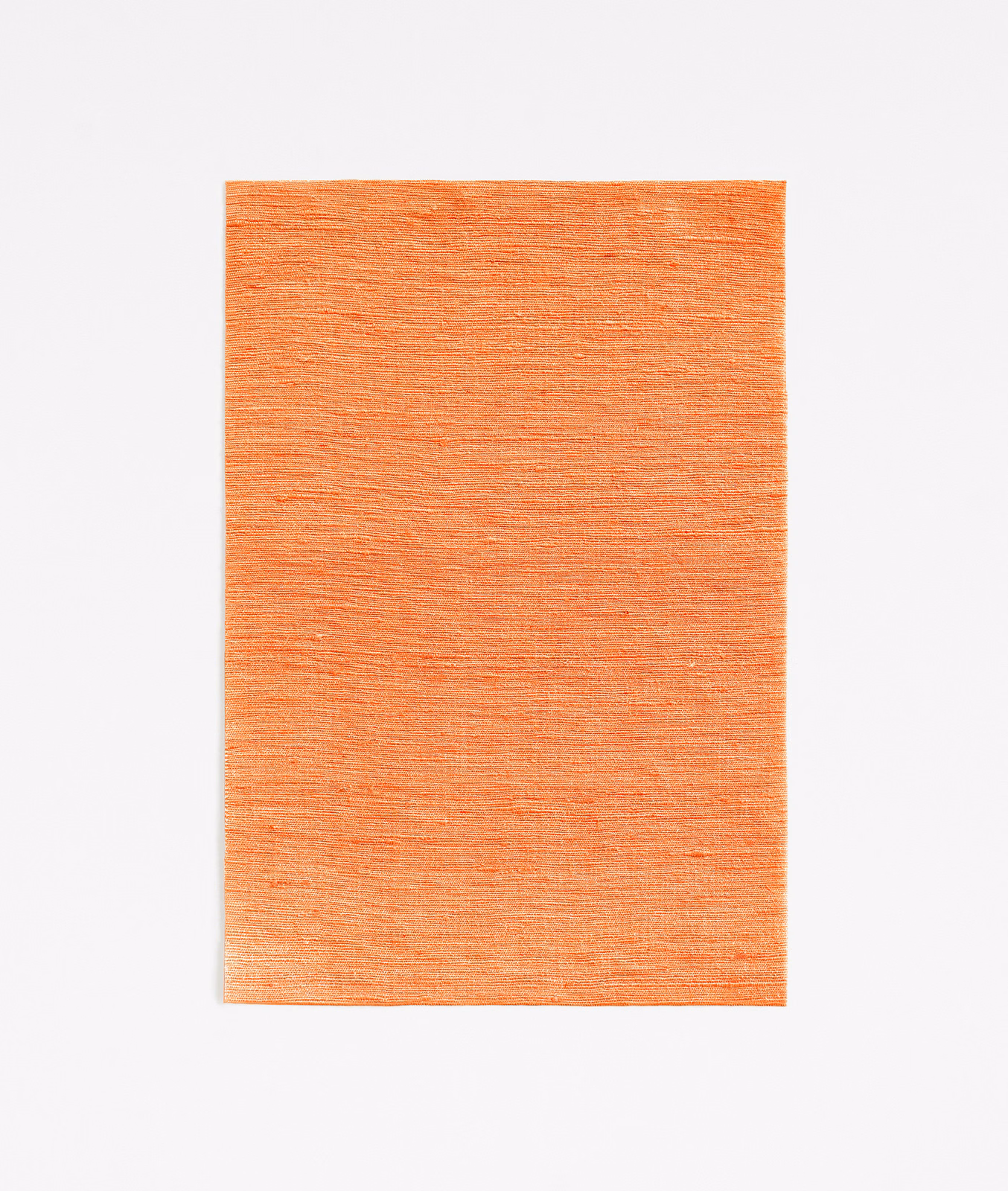 Warm tangerine orange fabric swatch with fine horizontal woven texture