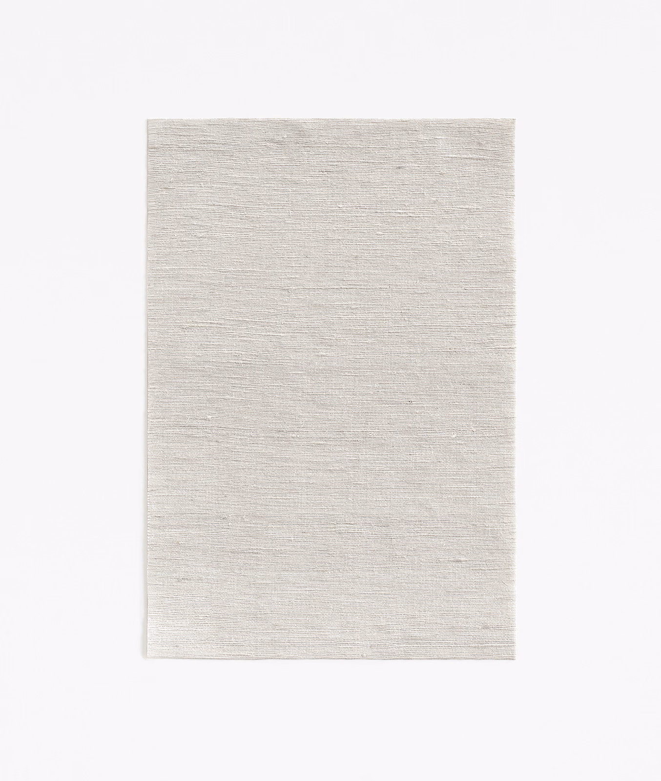 Pale misty greige fabric swatch with a fine horizontal slub weave
