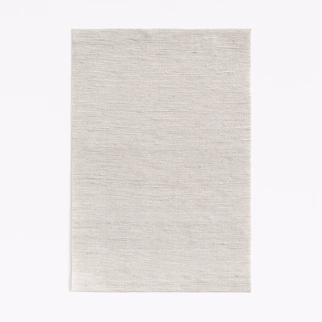 Pale misty greige fabric swatch with a fine horizontal slub weave