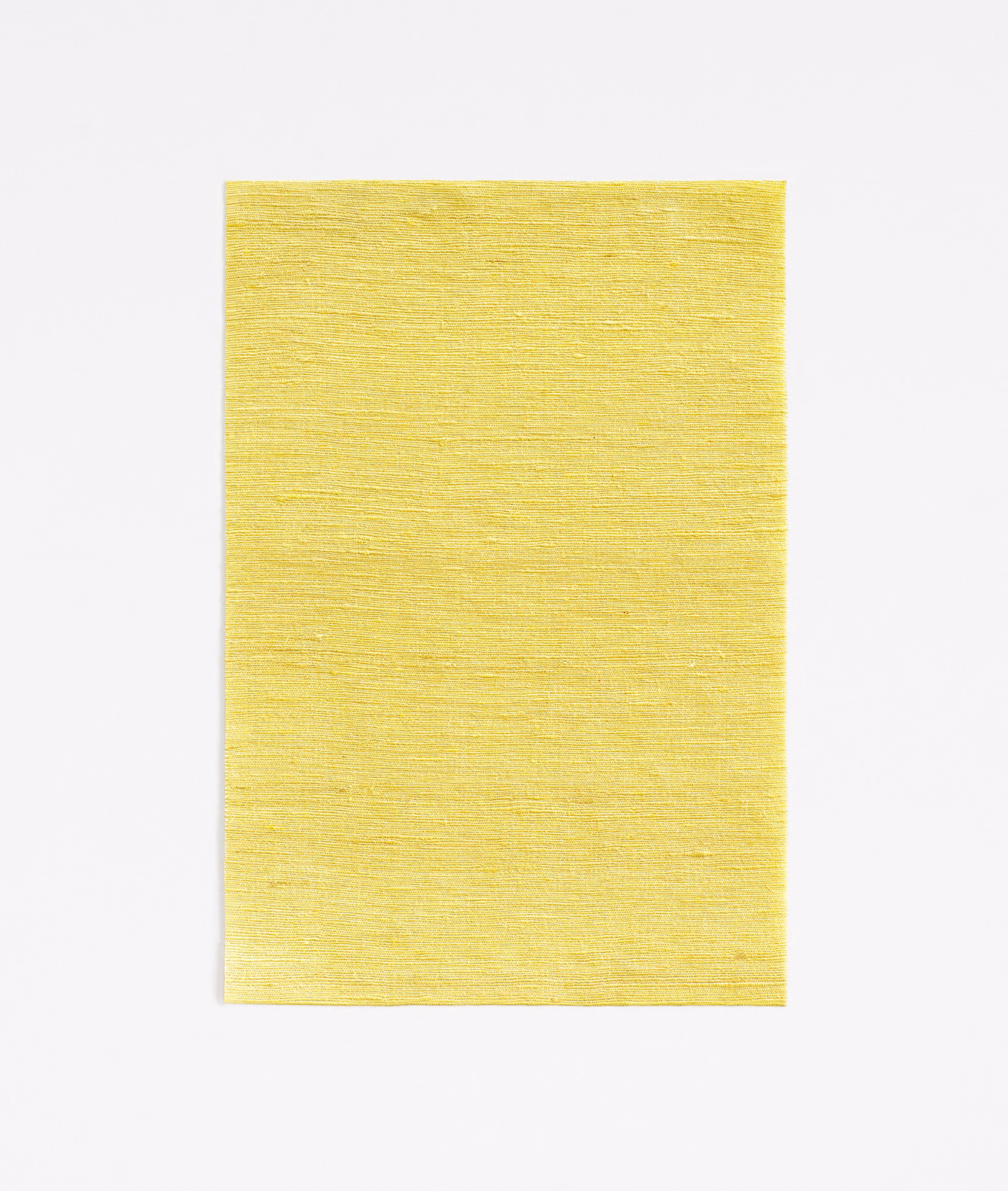 Citrine yellow fabric swatch with fine horizontal woven texture and softly varied surface