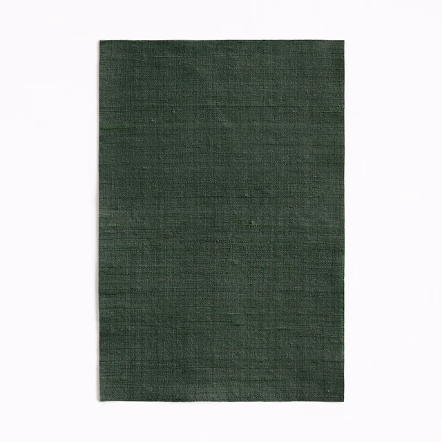 Dark forest green plain weave with subtle crosshatch texture and tonal depth