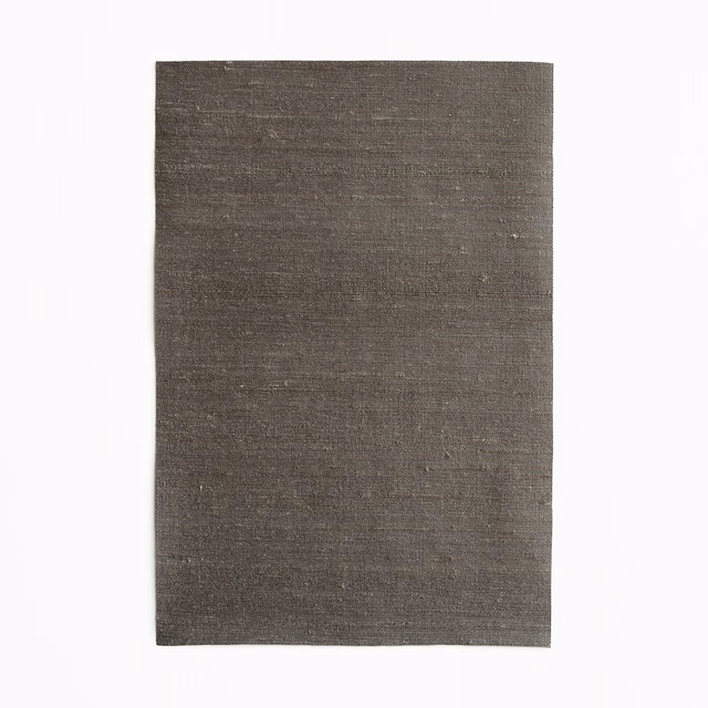 Deep graphite-grey fabric swatch with fine horizontal slub texture