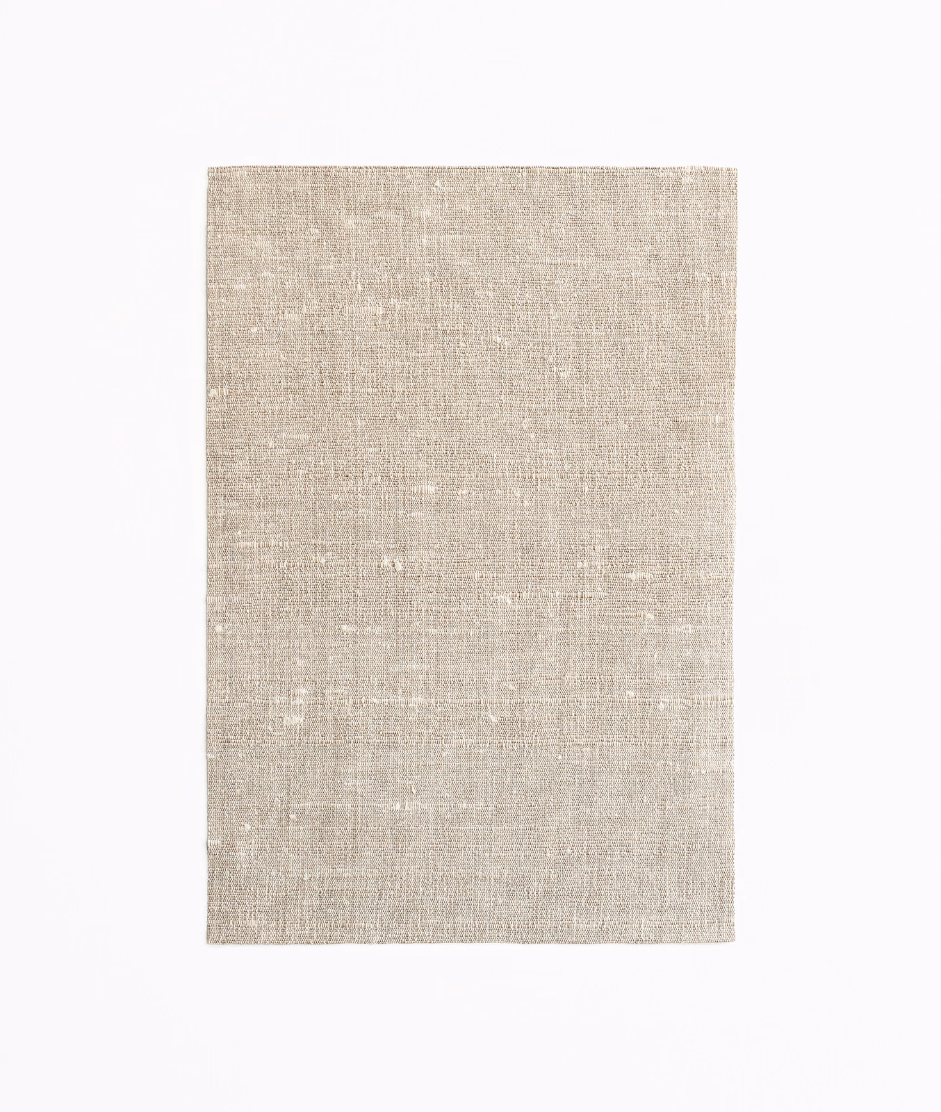 Pale taupe-grey Fanfara Meteorite textile with fine woven texture and subtle flecks