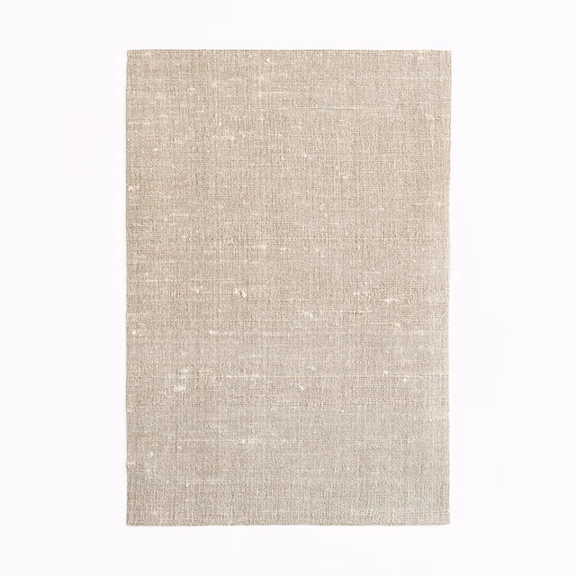 Pale taupe-grey Fanfara Meteorite textile with fine woven texture and subtle flecks