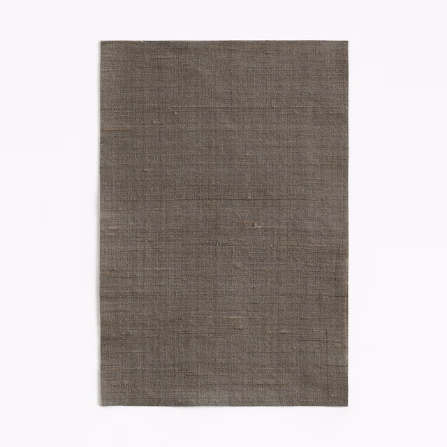 Dark taupe-grey woven swatch with subtle horizontal slubs and charcoal depth