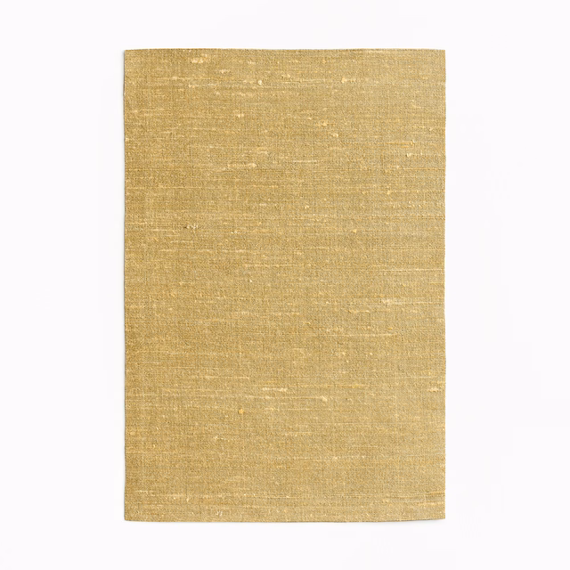 Warm ochre-gold woven swatch with fine horizontal slubs and softly varied surface