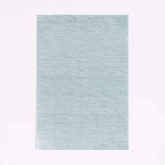 Pale blue-green Fanfara Topaze swatch with fine horizontal slub texture