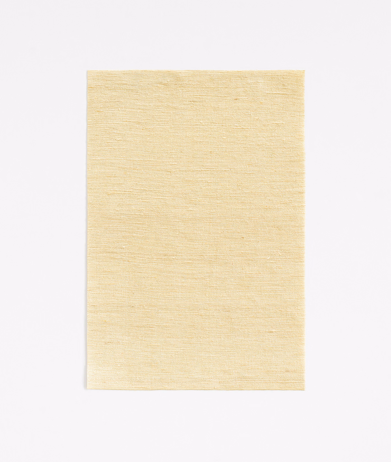 Pale vanilla cream curtain fabric with a fine horizontal slubbed weave