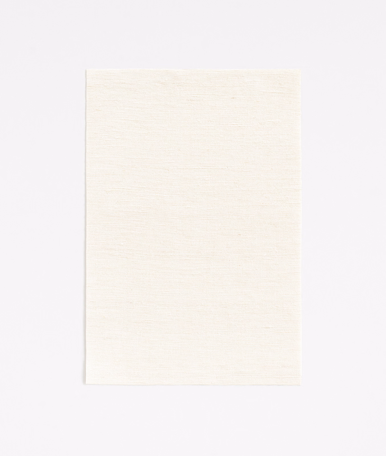 Soft ivory-white curtain fabric swatch with fine horizontal woven texture
