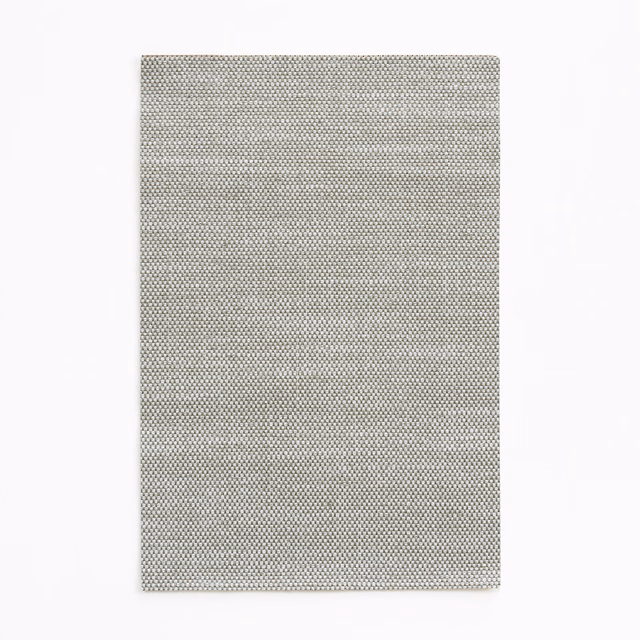 Muted aqua-grey woven textile with a tiny, even two-tone surface pattern