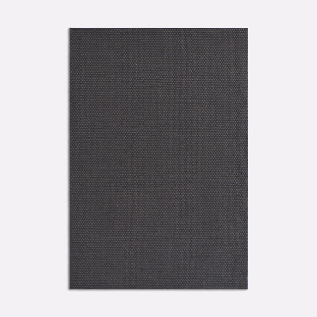 Close view of dark anthracite fabric with a fine, regular woven texture