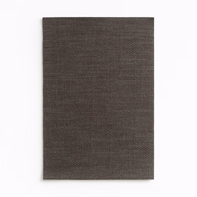 Dark brown-charcoal ardoise curtain fabric with a finely textured woven surface
