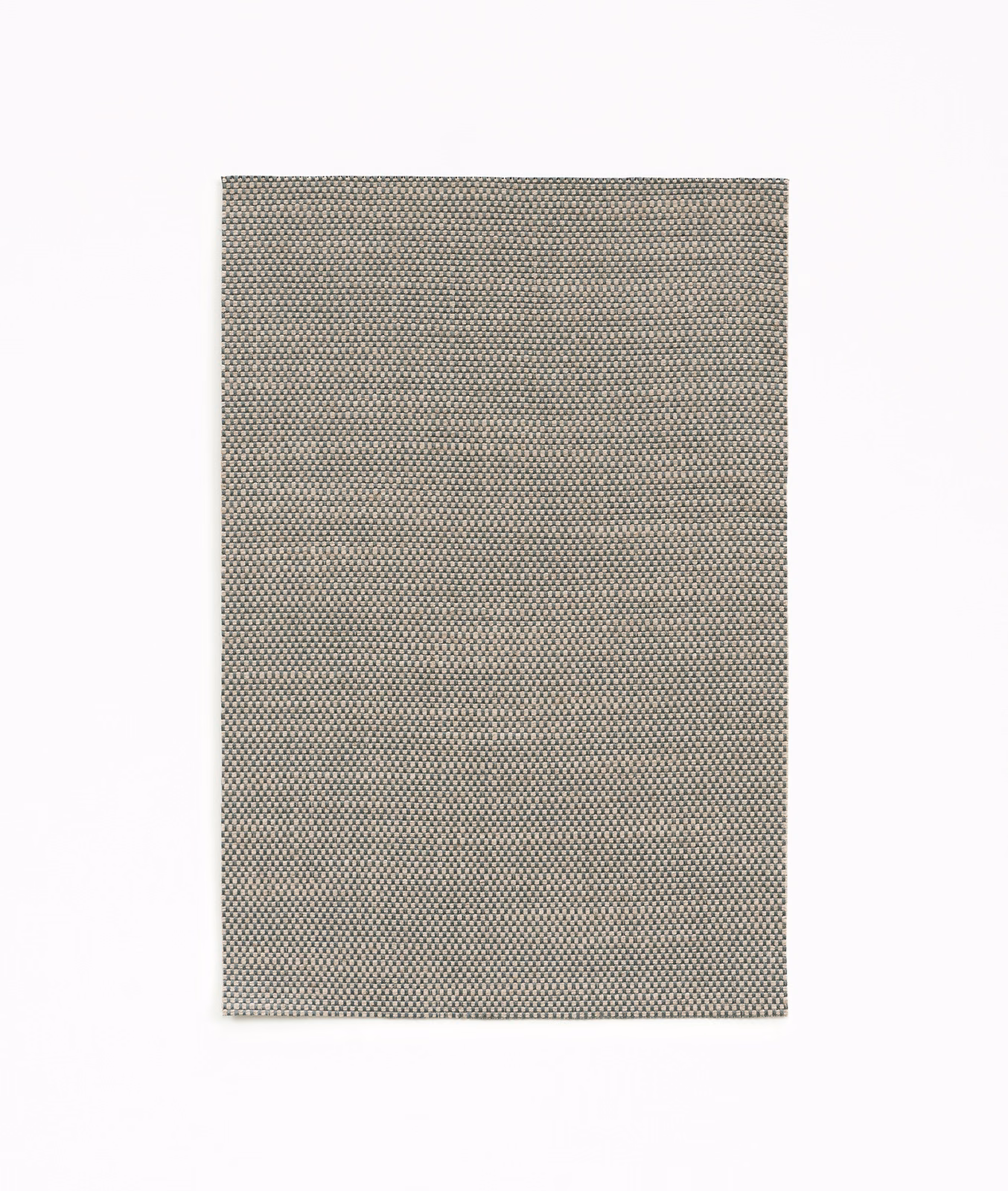 Silvery grey curtain fabric with a dense charcoal-and-cream micro-weave