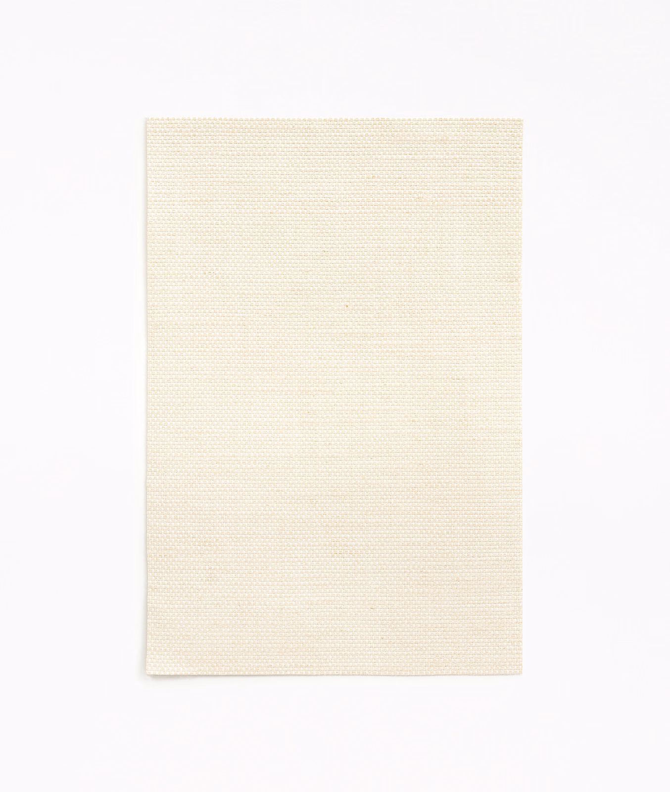 Pale ivory woven swatch with fine horizontal ribbing and softly warm tone