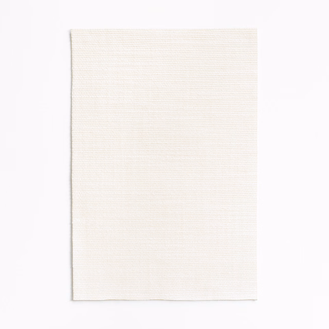 Pale ivory fabric swatch with fine horizontal ribbing and softly matte texture