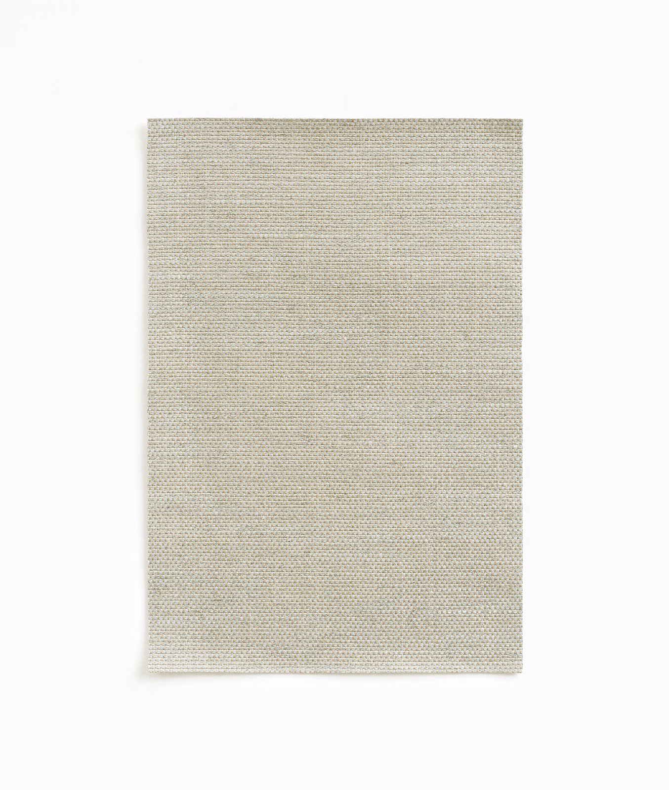 Pale nacre greige curtain fabric with fine horizontal weave and subtle ivory flecks