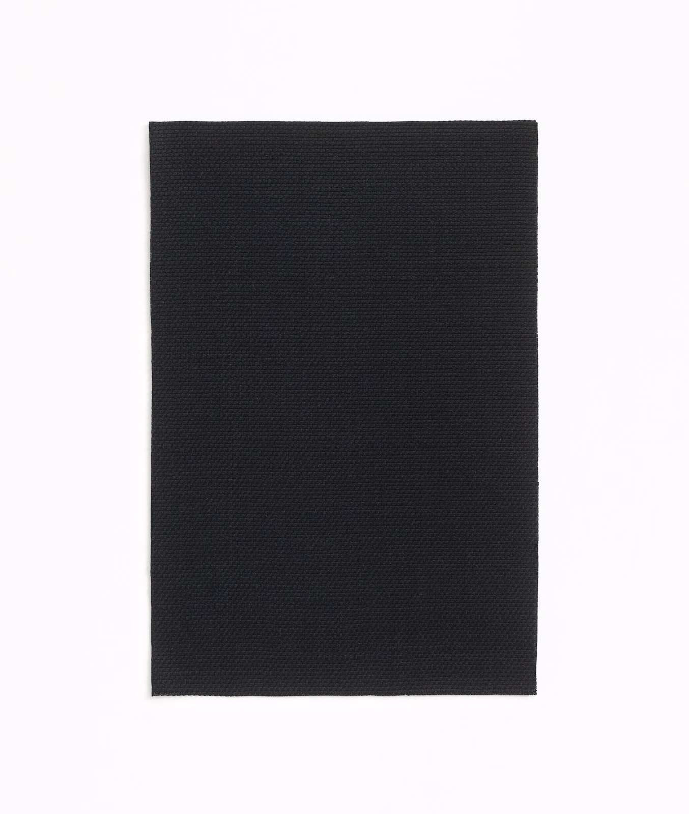 Near-black Dedar textile swatch showing a fine, even woven grain