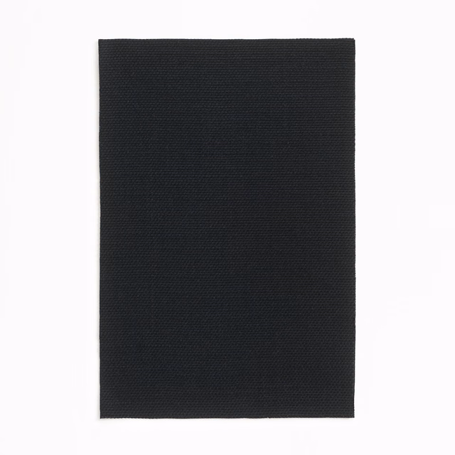 Near-black Dedar textile swatch showing a fine, even woven grain