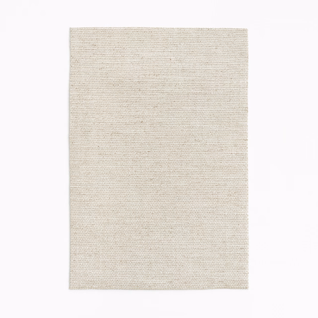 Pale pearl greige curtain fabric swatch with fine horizontal woven texture