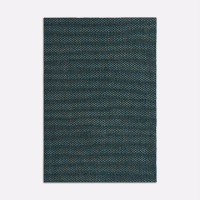 Dark petrol blue-green curtain fabric with a fine, softly flecked woven texture