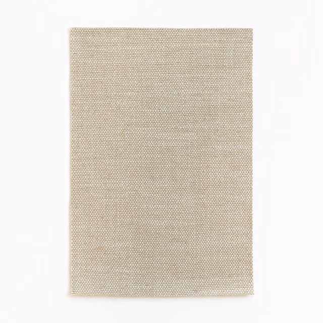 Warm sandy beige curtain fabric with a fine, evenly gridded woven texture