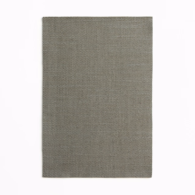 Muted mushroom-grey curtain fabric with a fine, tightly grained woven texture