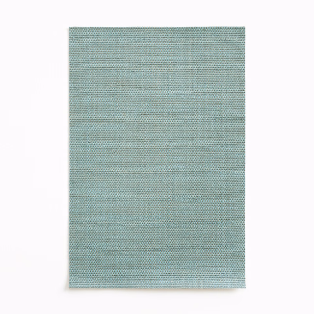 Pale turquoise textile swatch with a fine, tightly gridded woven surface